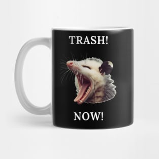 A possum demanding trash Mug